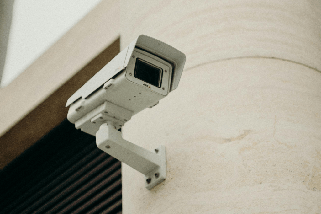 Surveillance camera on the side of a building